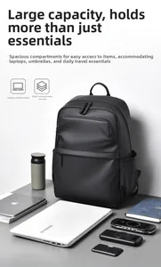 Detailed view of black business backpack featuring dedicated 15.6 inch laptop compartment