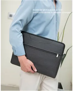 Close-up of waterproof Oxford fabric texture and zipper on grey business laptop bag