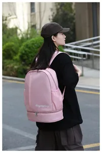 Pink waterproof fitness backpack with separate dry wet compartments and side pocket