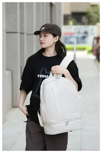 Detail of waterproof nylon travel backpack featuring dry-wet separation compartment