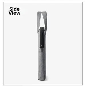 Side view of slim grey oxford fabric laptop bag with reinforced handles and metal zipper