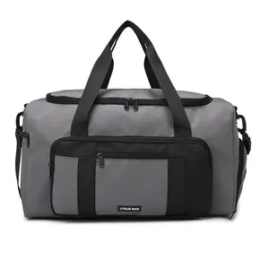 Large capacity grey travel duffel bag with detachable shoulder strap for gym and sports