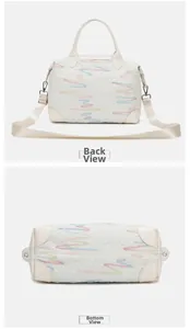 Detail view of large travel bag back and bottom with colorful wave embroidery