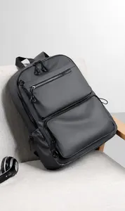 Detailed view of dark grey multifunctional business backpack with waterproof fabric