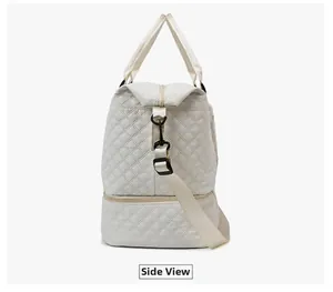 Side view of cream quilted duffel bag showing double-layer structure and strap hooks