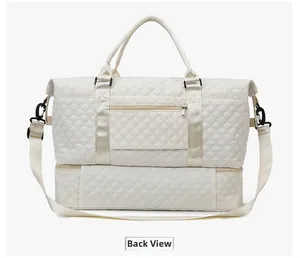 Back view of quilted travel bag featuring a rear zipper pocket and separate shoe compartment