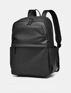 Detail view of the matte water-resistant fabric and side pocket on this black backpack