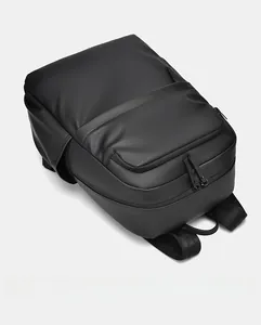 Top view of minimalist black PU leather backpack with wide straps and double zippers