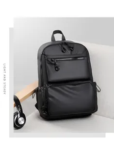 Detail view of water-resistant black business backpack with multi-compartment design