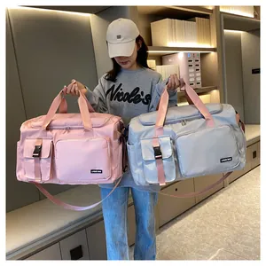 Bolsos de viaje rosas y grises impermeables con correas ajustables y compartimentos