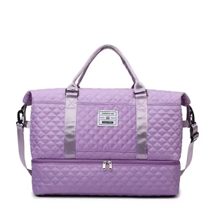 Purple quilted gym bag with shoe compartment and wet-dry separation travel tote