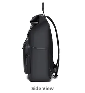Side view of black roll-top backpack with matte waterproof finish and padded straps