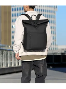 Close-up of waterproof roll-top backpack with buckle closure and vertical zipper pocket