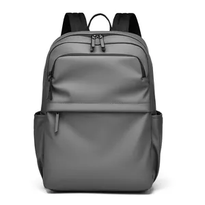 Minimalist grey PU backpack for 15.6 inch laptop with front zip pocket and padded straps