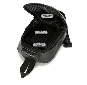 Internal compartments of black crossbody bag with mesh pocket and striped lining