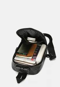 Detail of hard shell chest bag interior showing large capacity and anti-theft lock