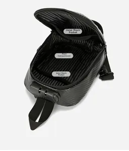 Internal layout of black chest bag showing main compartment and mesh pocket details