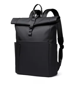 Detail view of the roll-top buckle closure and waterproof matte texture on the black backpack