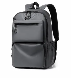 Detail view of water-resistant dark grey backpack with mesh breathable shoulder straps