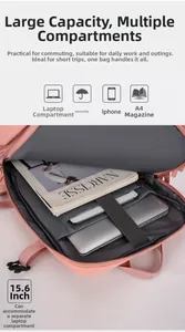 Internal view of pink travel backpack featuring a padded 15.6 inch laptop compartment