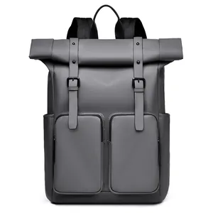 Minimalist grey-black roll-top backpack with dual buckle straps and waterproof matte finish