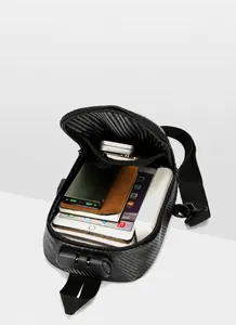 Detail of waterproof crossbody bag with carbon fiber texture and secure combination lock