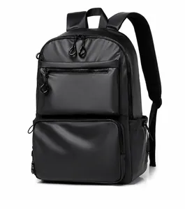 Detailed side view of black waterproof travel backpack with multi-layer zipper pockets