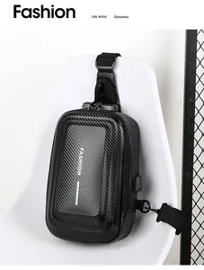 Detail of hardshell chest bag with carbon fiber texture, security lock, and USB port