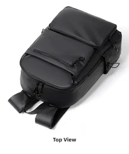 Top view of black waterproof backpack showing multi-pocket design and matte finish