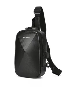 Detail of anti-theft combination lock and USB charging port on black hardshell chest bag