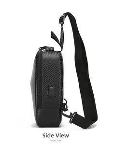 Side view of black hard shell chest bag featuring USB charging port and carbon fiber texture
