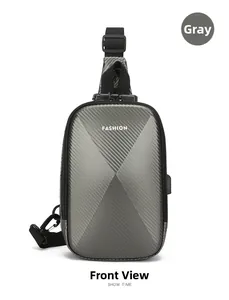 Front view of grey hard shell chest bag with carbon fiber texture and TSA lock system