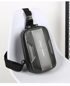 Detail of grey carbon fiber chest bag featuring a secure 3-digit combination lock