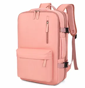 Pink travel backpack showing side view with adjustable buckles and padded handle