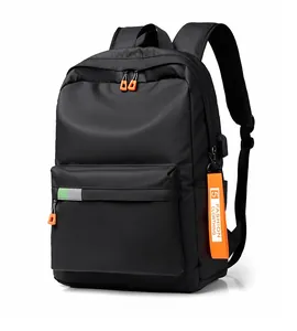 Detail of black nylon laptop backpack with USB port, reflective strip and orange zipper pulls