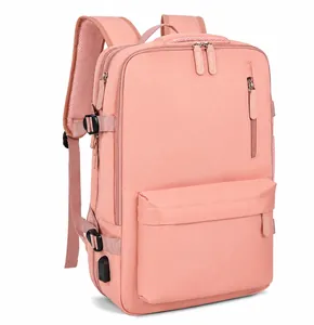 Pink travel backpack side detail featuring an external USB charging port and straps