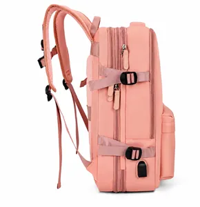 Side view of pink travel backpack featuring USB port and breathable mesh straps