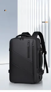 Detail view of the expandable side structure and USB port of the black travel backpack