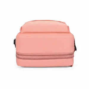 Detail view of pink travel backpack base featuring double expandable zippers and buckle