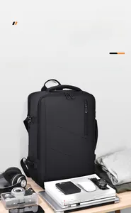 Black expandable business backpack detail showing large capacity for laptop and gear