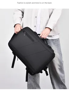 Detail of reinforced padded handle on water-resistant black business laptop backpack