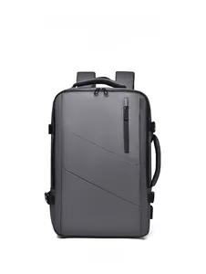 Front view of expandable grey travel backpack with water-resistant fabric and dual handles