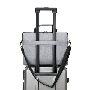 Sacoche PC portable grise avec sangle pour bagage et bandoulière réglable pour voyage