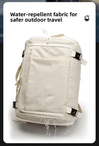 Water-resistant creamy white travel backpack showing droplet test on durable fabric surface