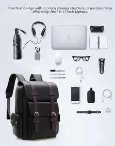Flat lay of retro business backpack with 17 inch laptop and travel accessories on gray surface