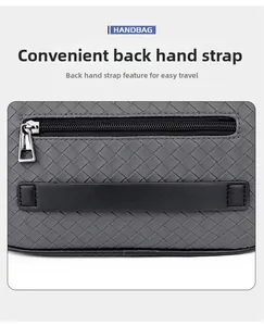 Detailansicht der Rückseite der grauen Web-Handtasche mit Handschlaufe und Metallreißverschluss