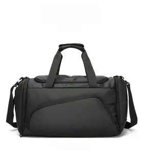 Detail of waterproof black travel bag showing matte nylon texture and heavy-duty zippers