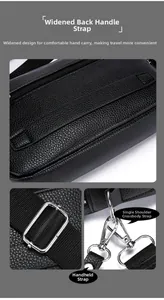 Detail des breiten Tragegriffs und der silbernen Metallschnalle an schwarzer Ledertasche