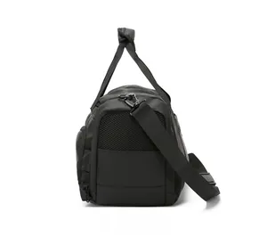 Side view of black travel bag showing honeycomb mesh breathable vent and durable zippers