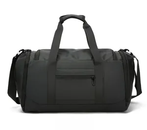 Rear view of large black travel bag with reinforced handles and adjustable strap